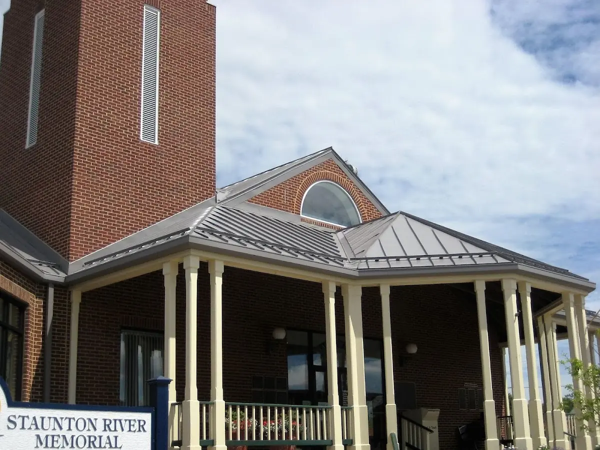 Skilled roofing craftsmen working on a residential roof in Hainesville